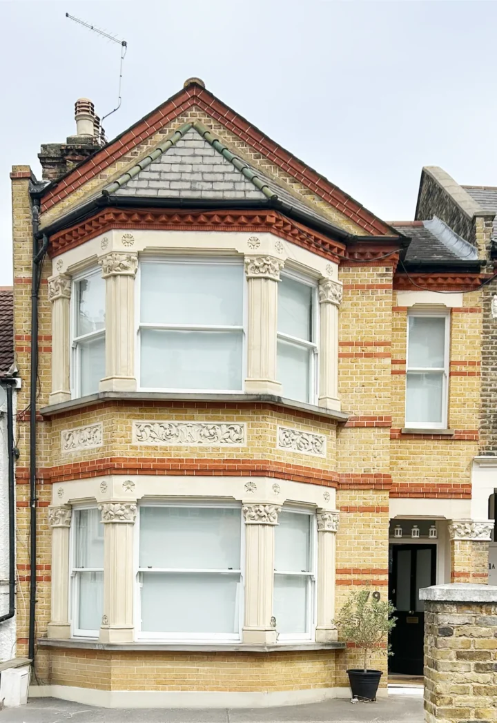 Facade after the resotration of the bricks and bath stone window columns and wall plaques